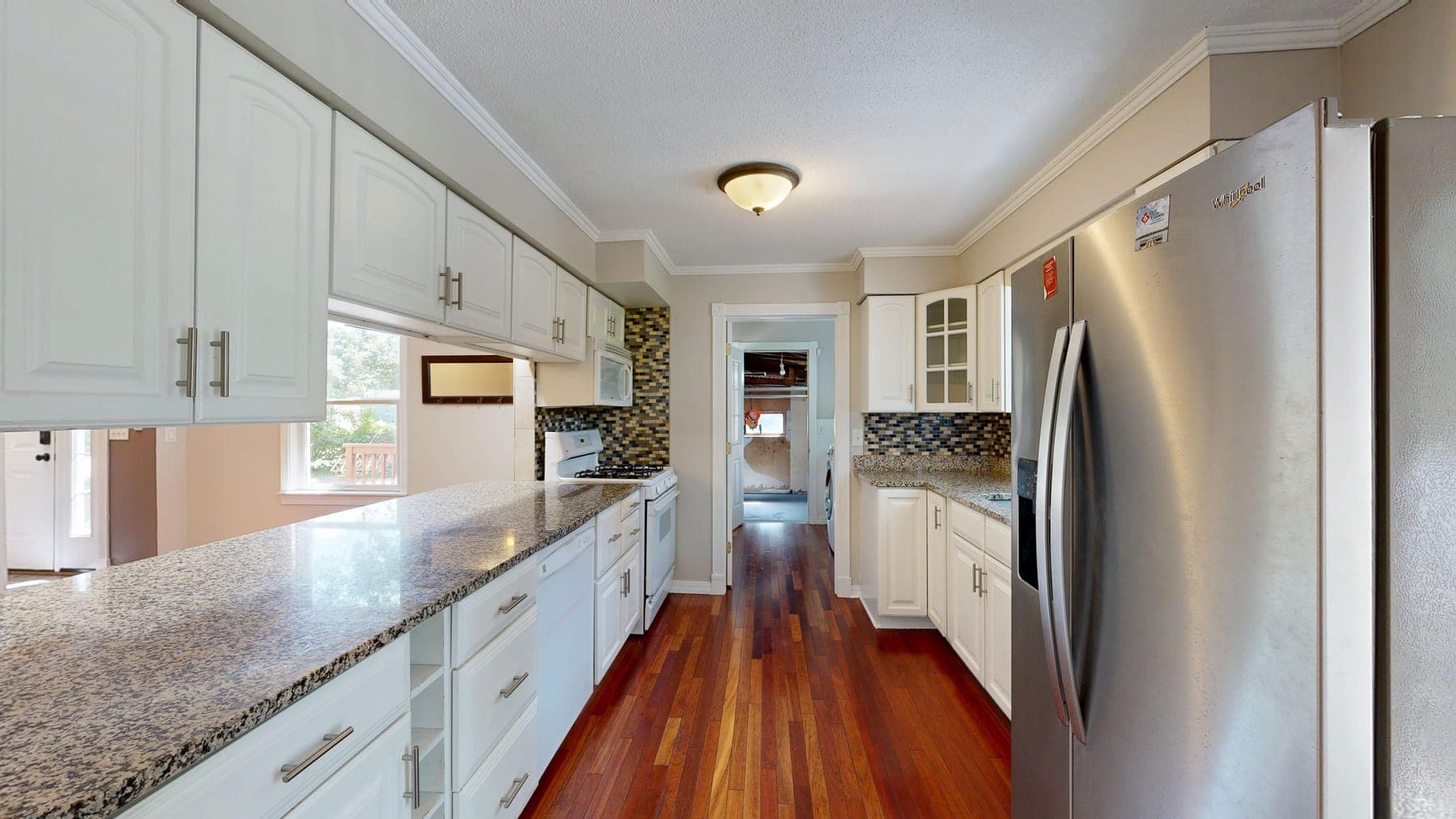 The finished galley run, looking down to the fridge wall